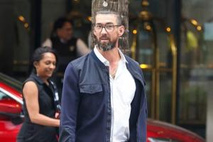 邮报：40岁泳坛传奇菲尔普斯参加活动，和运动员时期造型截然不同