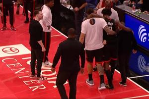 还是好兄弟！伊森受伤 亚当斯将其搀扶离场 两人此前曾有过冲突